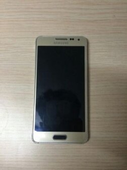 Samsung Alpha gouden scherm met zwarte knop en achterkant